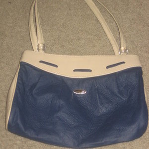 Navy Blue & Tan Purse is being swapped online for free