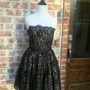 NWT Neiman Marcus black nude lace dress size 4 is being swapped online for free