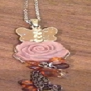 Butterfly charm pendant/ necklace - vintage style. is being swapped online for free