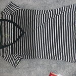 BNWOT balck and white striped shirt is being swapped online for free