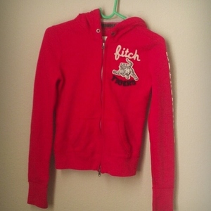 Orangy-Redish Abercrombie Sweater is being swapped online for free