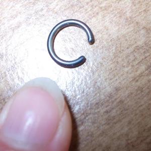 very small BLUE belly button ring is being swapped online for free