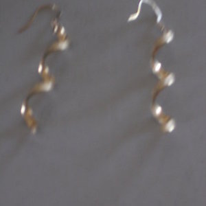 Gold-Colored ZigZag Dangle Earrings is being swapped online for free