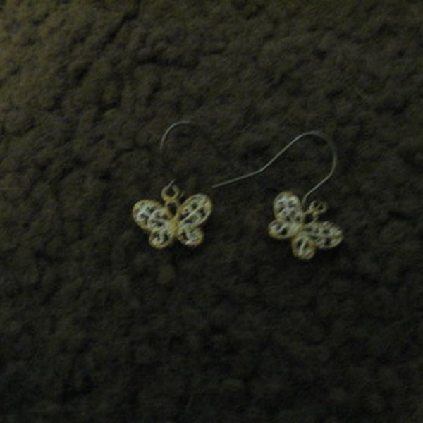 silver and gold filigree butterfly earrings is being swapped online for free