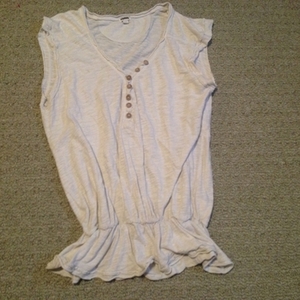 WHITE SLEEVELESS RUFFLY TOP is being swapped online for free