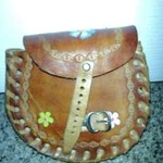 SMALL LEATHER FLOWER PURSE is being swapped online for free