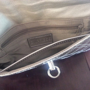 Express silver clutch is being swapped online for free