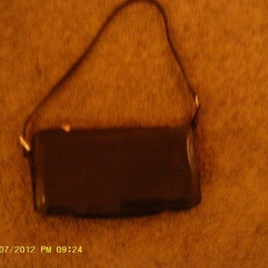 Black Patent Kate Spade Purse is being swapped online for free