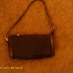 Black Patent Kate Spade Purse is being swapped online for free