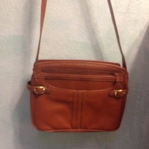 Brown shoulder or cross body bag is being swapped online for free