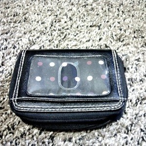 LIKE NEW BLACK WITH POLKA DOTS LEATHER WALLET is being swapped online for free