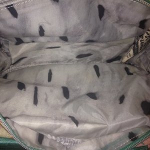 Nwot donut harajuku lovers bag  is being swapped online for free