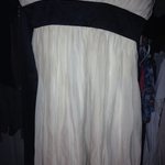 Cream dress with black belt  is being swapped online for free