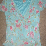 Very Cute Blue Floral Top Size Medium is being swapped online for free