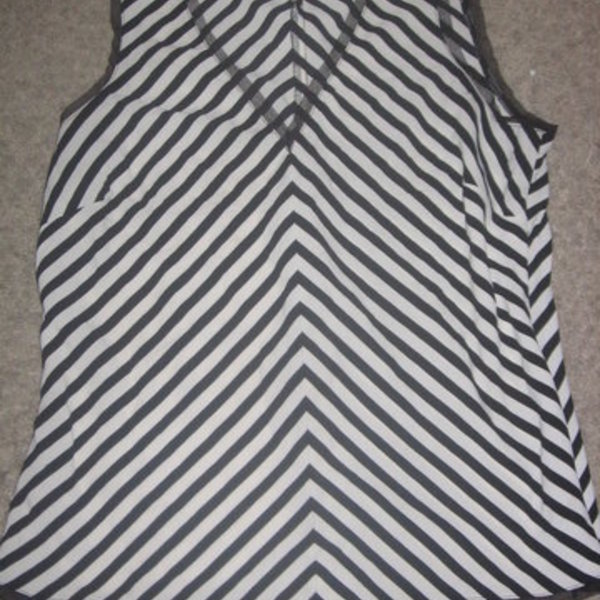 Old Navy Black & White Striped Top Medium is being swapped online for free