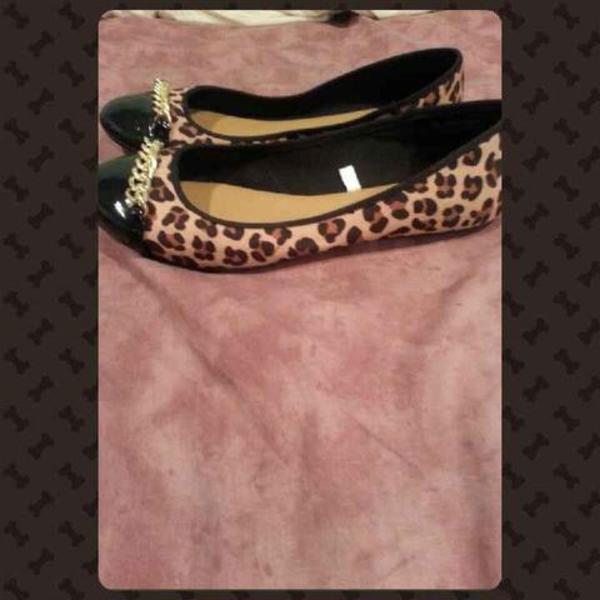 NWOT Cute cheetah flats is being swapped online for free