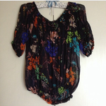 flowery flowy top S/M is being swapped online for free