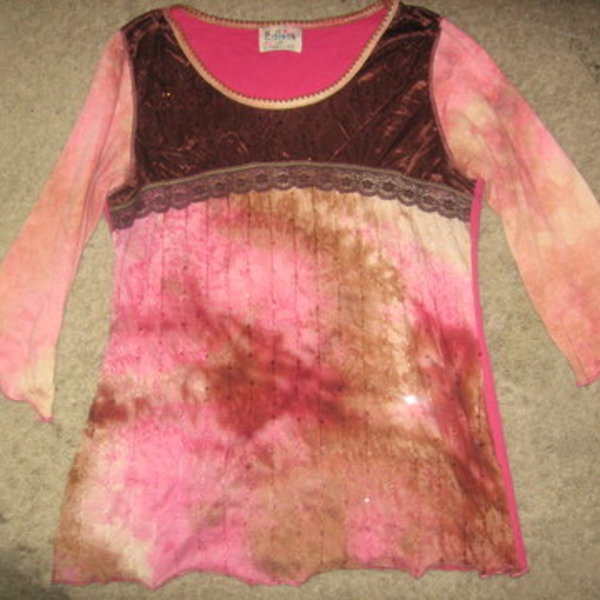 Pink Top Size Medium is being swapped online for free