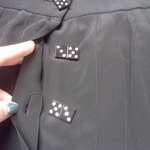 CHLOE Couture Black Mid Length Skirt with Diamond Dice Buttons is being swapped online for free