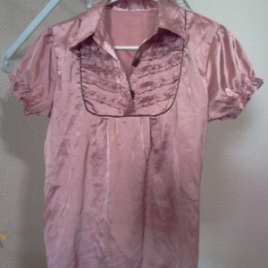 pretty old rose colored formal blouse is being swapped online for free