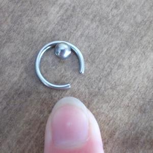 large naval/nipple ring is being swapped online for free