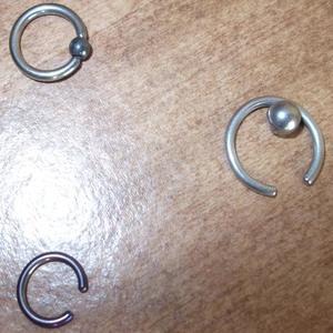 large naval/nipple ring is being swapped online for free