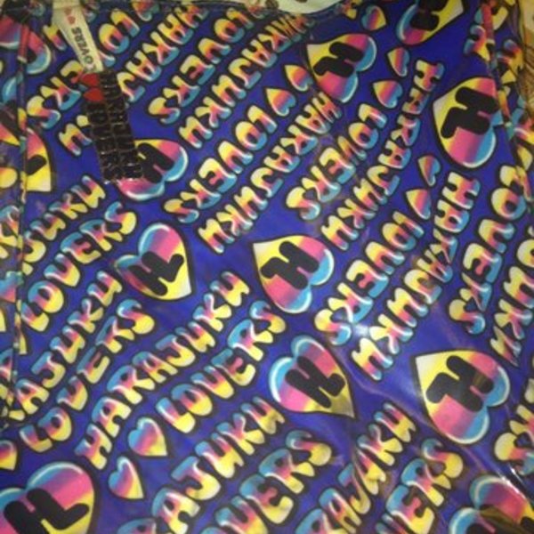 Nwot colorful harajuku lovers bag is being swapped online for free