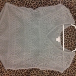 grey nittted top is being swapped online for free