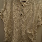 Loose off-white blouse is being swapped online for free