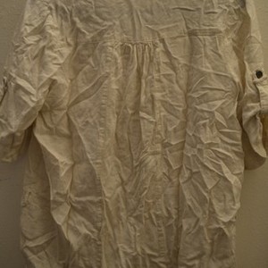 Loose off-white blouse is being swapped online for free