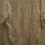 Loose off-white blouse is being swapped online for free