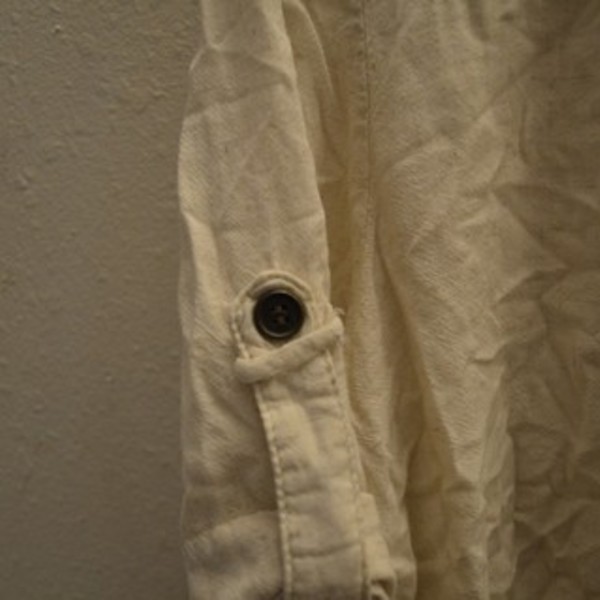 Loose off-white blouse is being swapped online for free