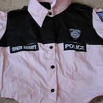 Officer Naughty Collared Shirt is being swapped online for free