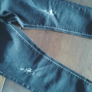 brand new ripped jeans is being swapped online for free