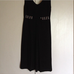 Sleeveless black dress with white/red studs M is being swapped online for free