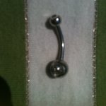 Belly piercing with small rhinestone nickel-free stainless steel is being swapped online for free
