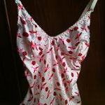 Flattering Made-In-Italy silk top adjustable straps cup size C is being swapped online for free