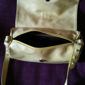 Made In Italy faux-leather cream-yellow handbag is being swapped online for free