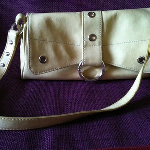 Made In Italy faux-leather cream-yellow handbag is being swapped online for free