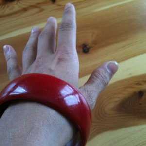 Red shiny bangle is being swapped online for free