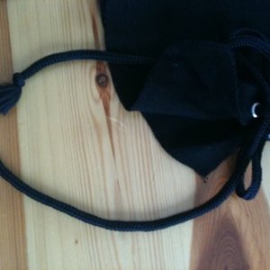 V-neck black and purple dragon top, ties on sides with strings, size xs is being swapped online for free