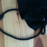 V-neck black and purple dragon top, ties on sides with strings, size xs is being swapped online for free