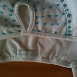 White spaghetti top with peep-hole and blue sequins is being swapped online for free