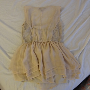 American Rag Flowy Top XS is being swapped online for free