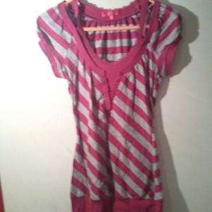 Majenta and grey striped shirt is being swapped online for free