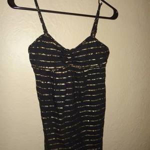 Black Poppy top size S is being swapped online for free