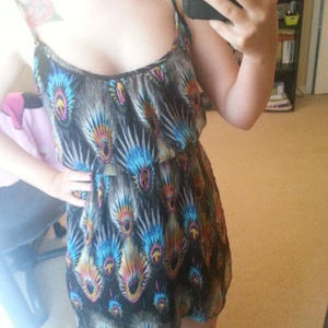 peacock pattern dress is being swapped online for free