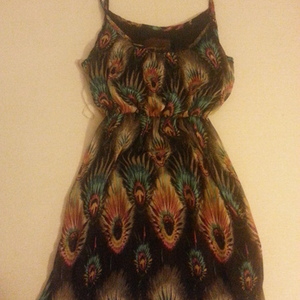 peacock pattern dress is being swapped online for free