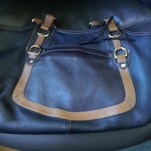 COLE HAAN LARGE LEATHER BAG is being swapped online for free