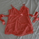 Peachy Coral Colored Baby Doll Tank is being swapped online for free